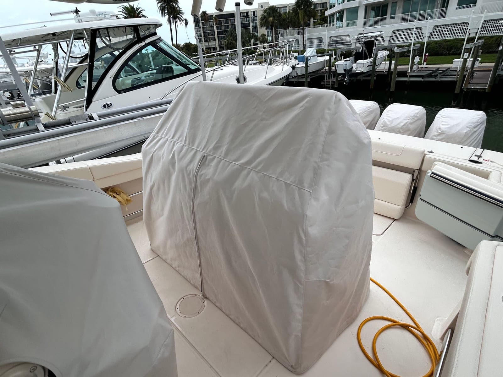 Center-console boat at a Tampa Bay marina where a mobile technician can perform dockside service