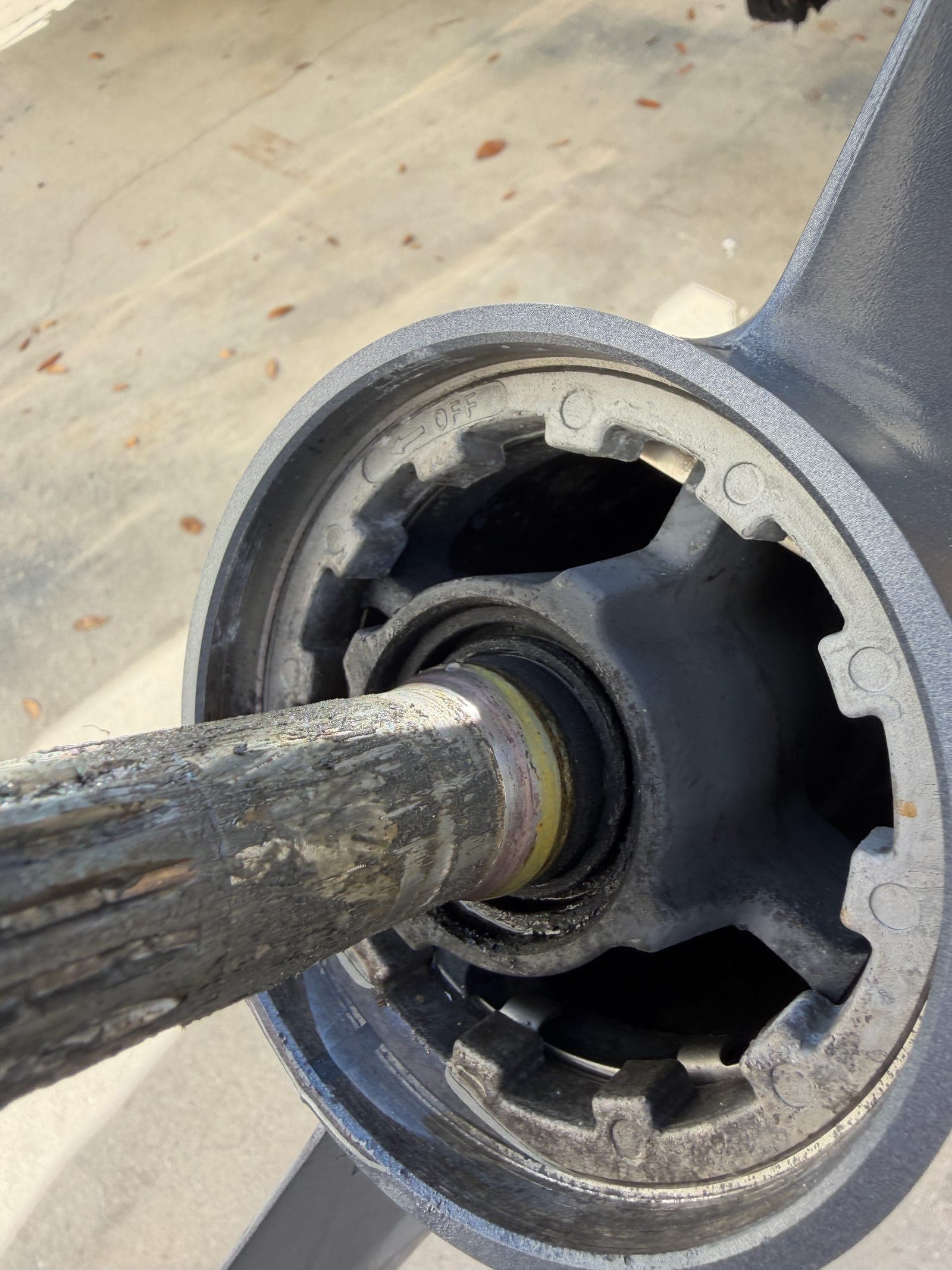 Lower-unit driveshaft and water-pump seal area on a Yamaha outboard — the parts that fail when the 300-hour water pump replacement gets skipped